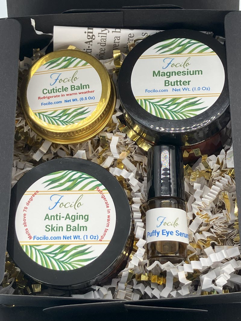 Beauty Box contains Anti-Aging Skin Bal, Cuticle Balm, Magnesium Butter, Puffy Eye Serum roller